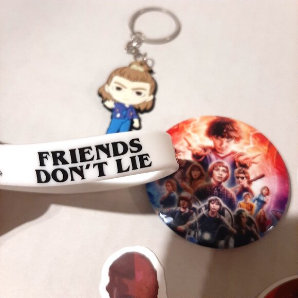 Stranger Things Eleven Fan gift set Keyring Pin Rubber Bracelet Decal Stickers - Picture 3 of 4